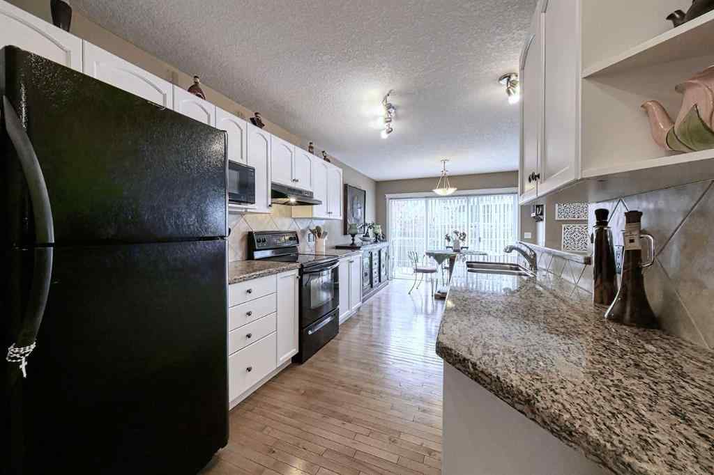 MLS® A2264395 - 73 Everwoods Road SW in Evergreen Calgary, Residential