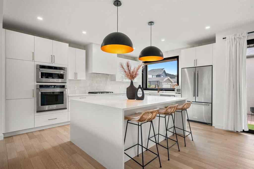 MLS® A2264396 - 27 Bluerock Avenue SW in Alpine Park Calgary, Residential