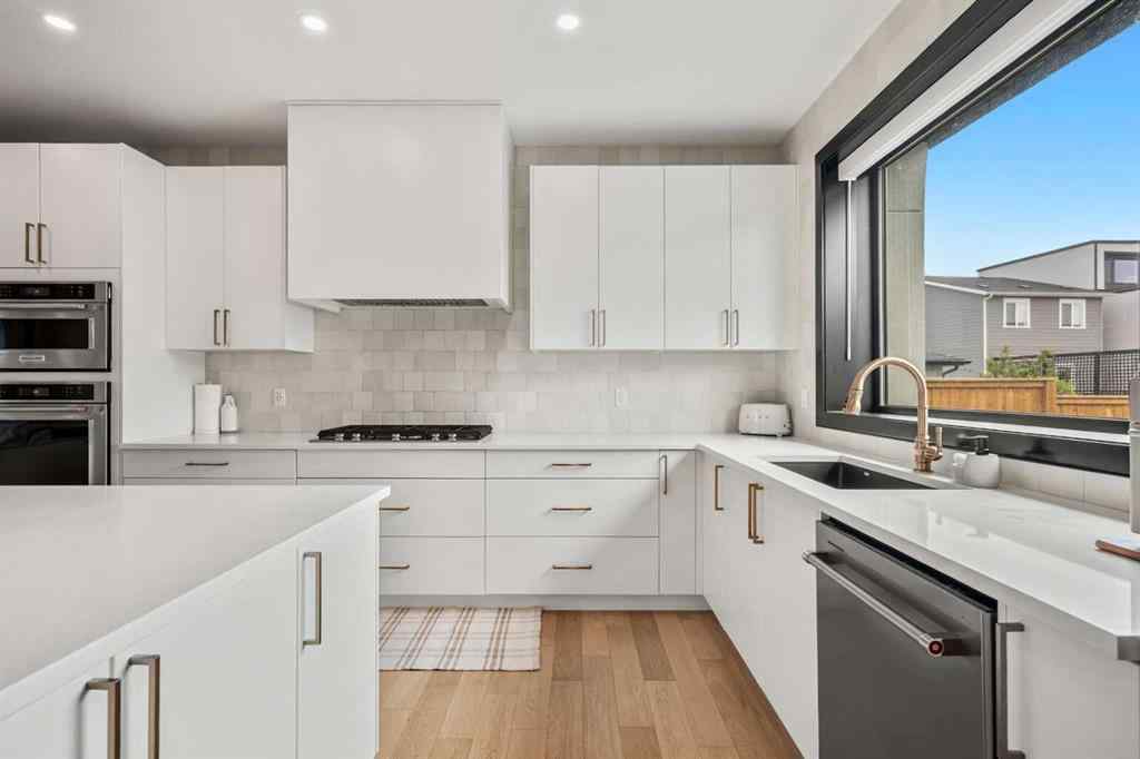 MLS® A2264396 - 27 Bluerock Avenue SW in Alpine Park Calgary, Residential