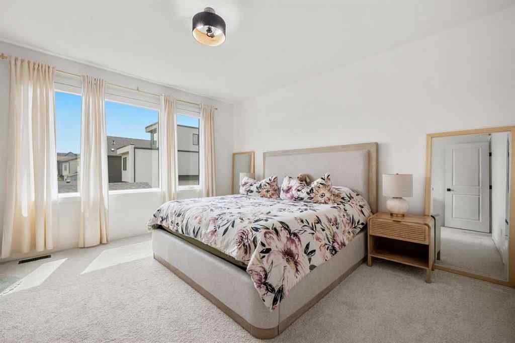 MLS® A2264396 - 27 Bluerock Avenue SW in Alpine Park Calgary, Residential