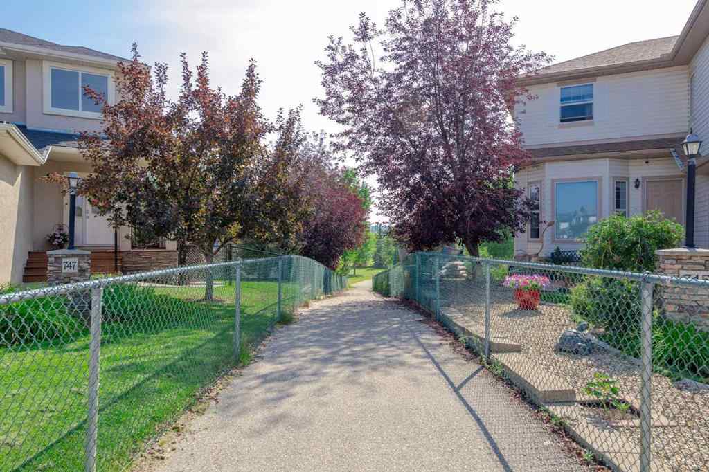 MLS® A2264411 - 754 Cimarron Close  in Cimarron Okotoks, Residential