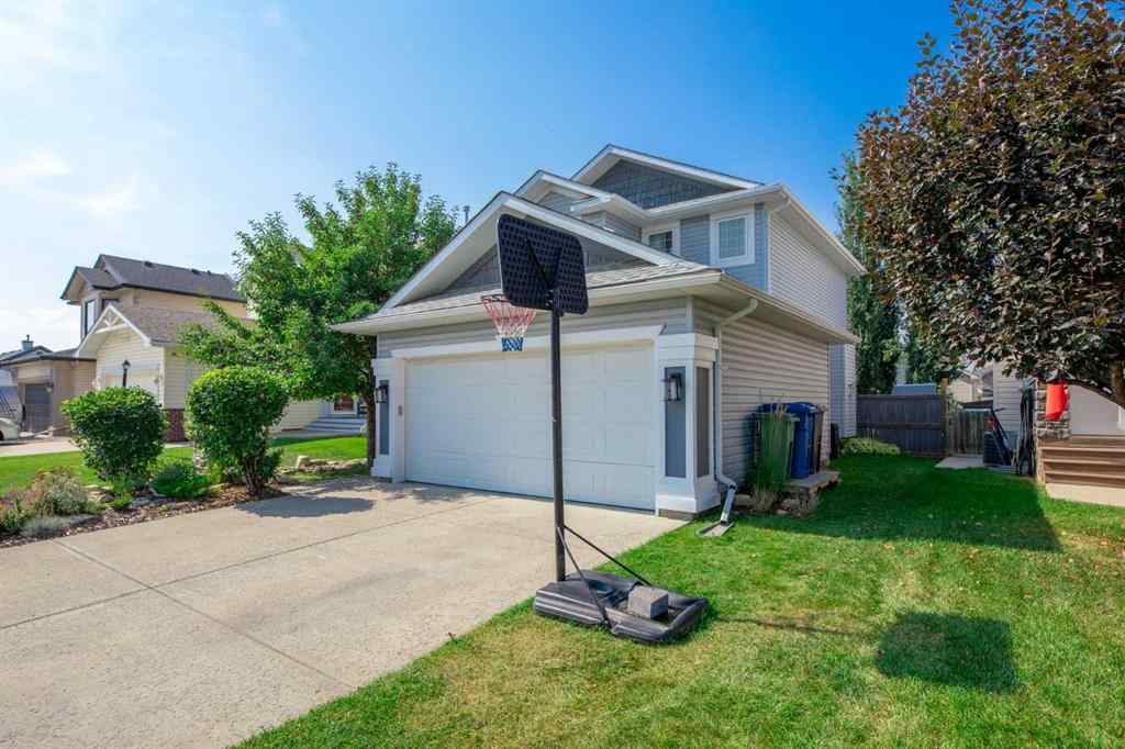 MLS® A2264411 - 754 Cimarron Close  in Cimarron Okotoks, Residential