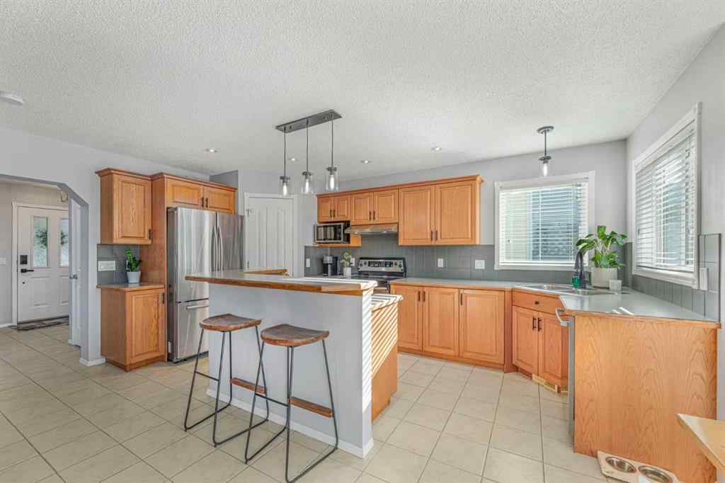 MLS® A2264411 - 754 Cimarron Close  in Cimarron Okotoks, Residential