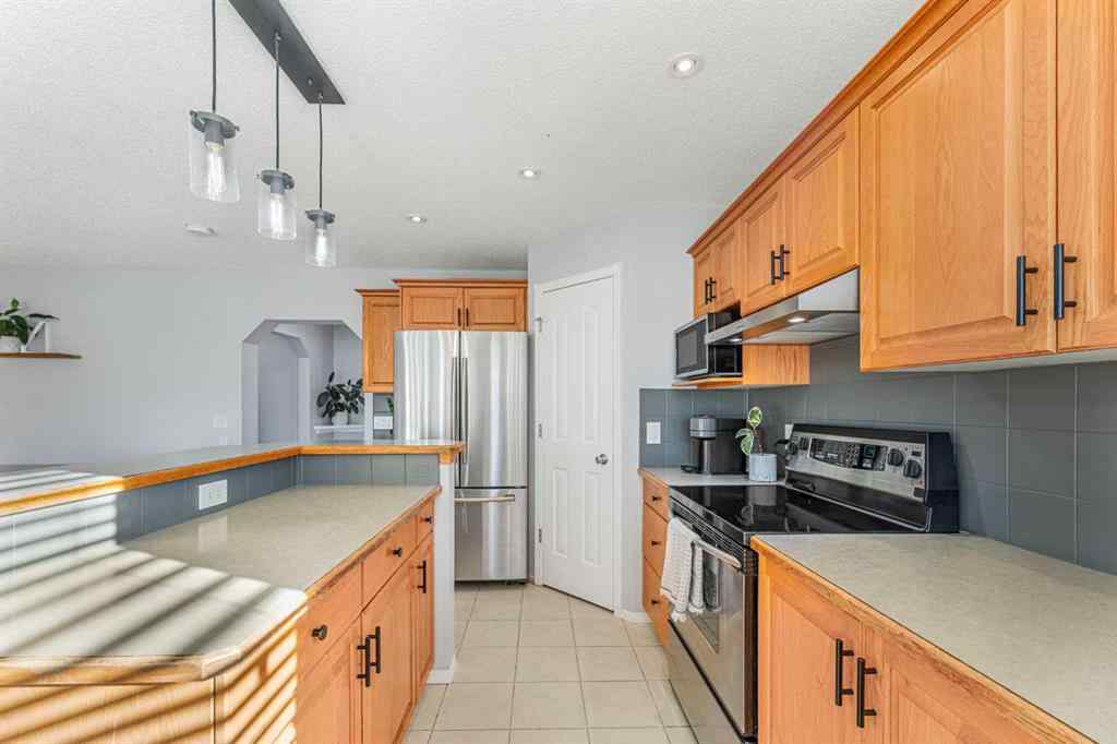 MLS® A2264411 - 754 Cimarron Close  in Cimarron Okotoks, Residential