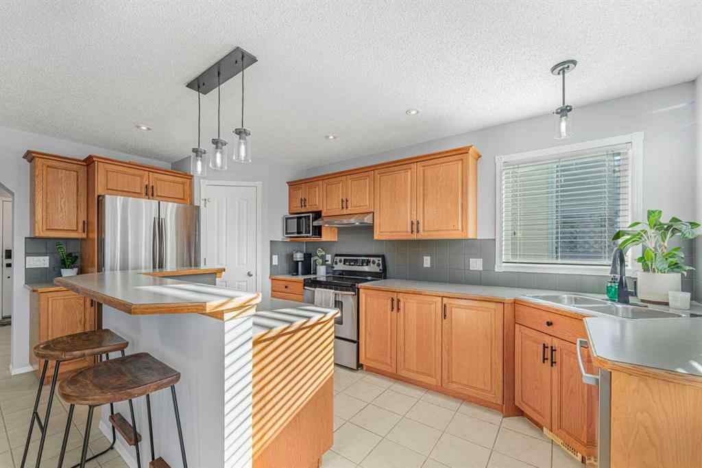 MLS® A2264411 - 754 Cimarron Close  in Cimarron Okotoks, Residential