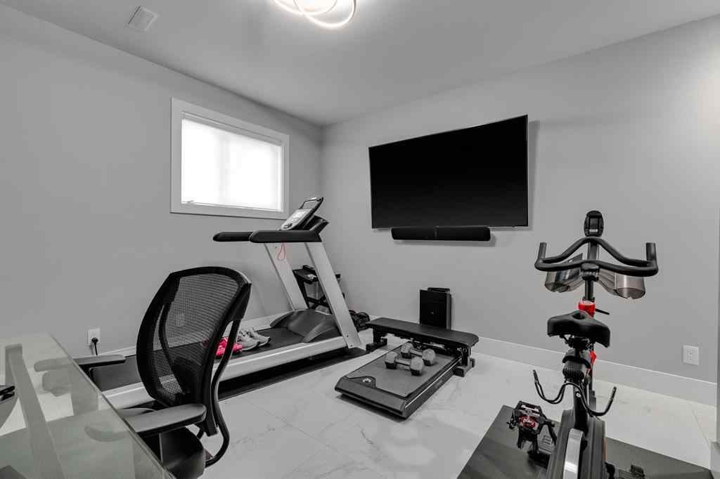 MLS® A2264415 - 50 Signature Heights SW in Signal Hill Calgary, Residential