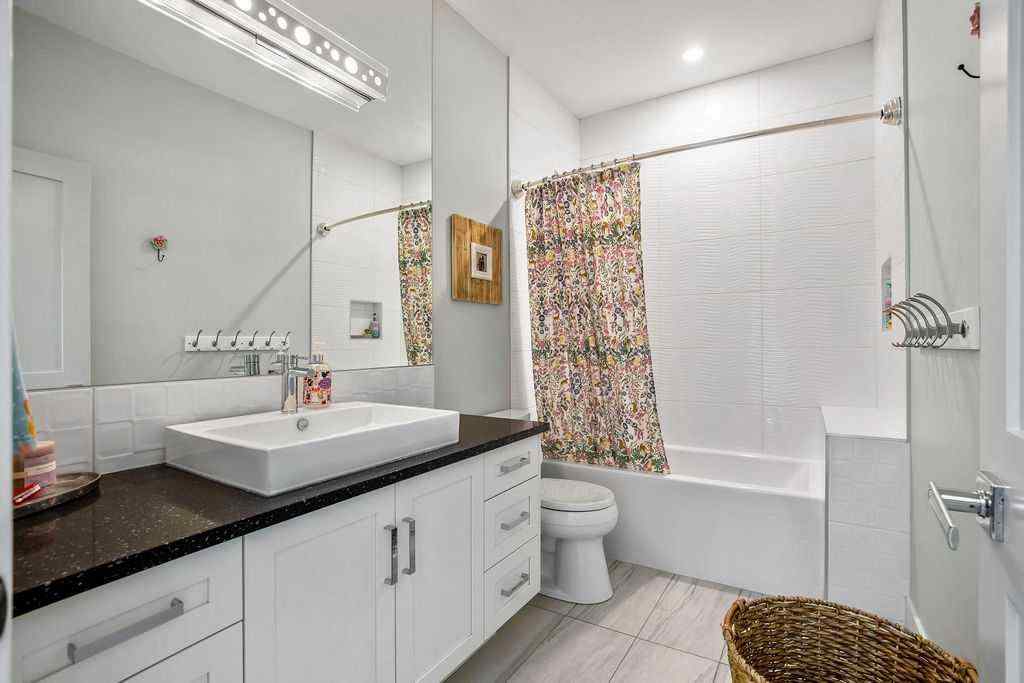 MLS® A2264420 - 68 White Oak Crescent SW in Wildwood Calgary, Residential