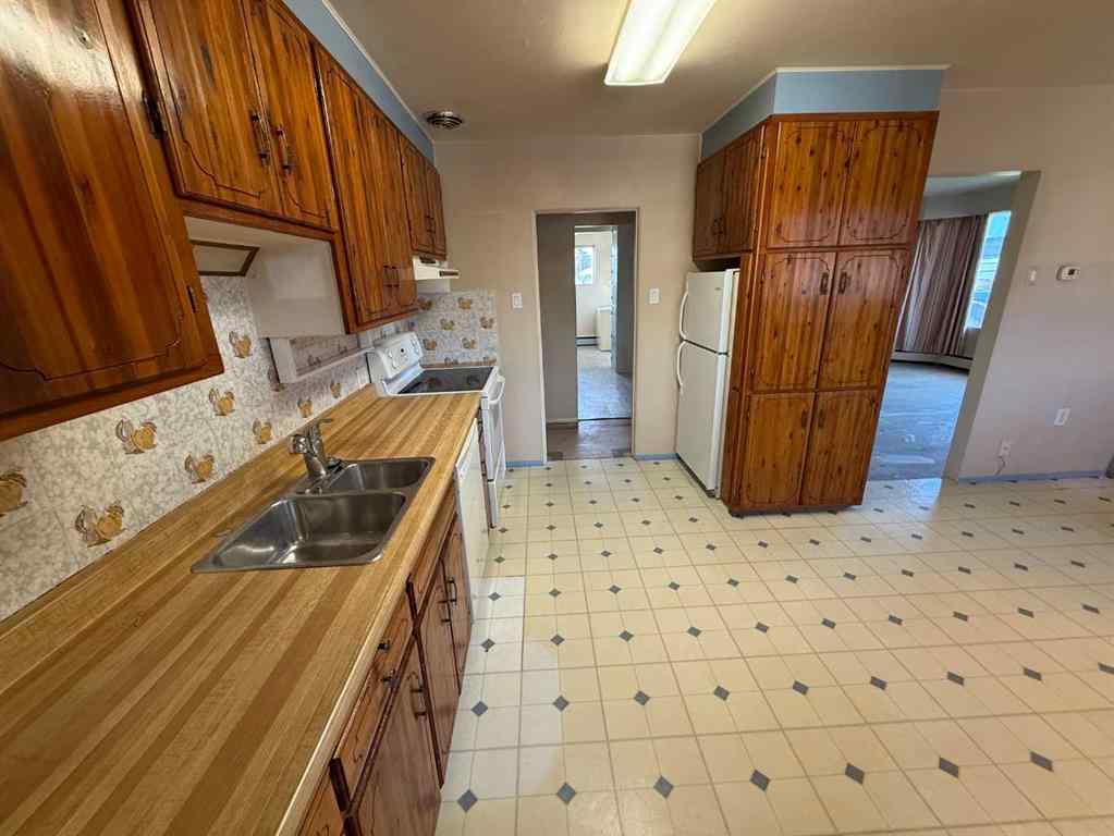 MLS® A2264437 - 121 Poboktan Road  in Hardisty Hinton, Residential