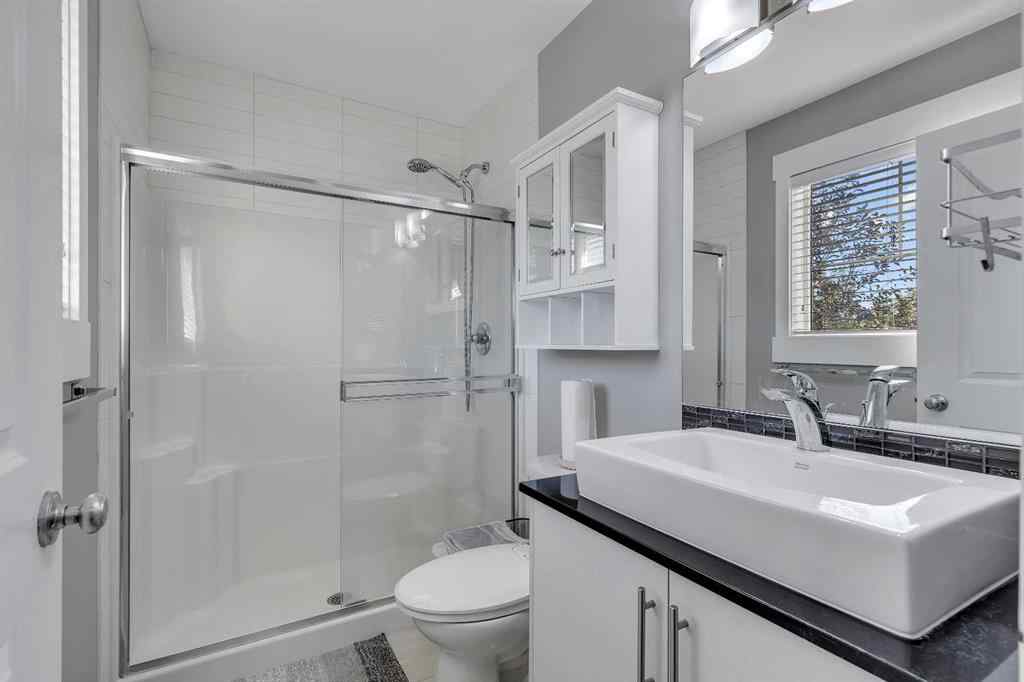 MLS® A2264462 - 7 West Coach Manor SW in West Springs Calgary, Residential