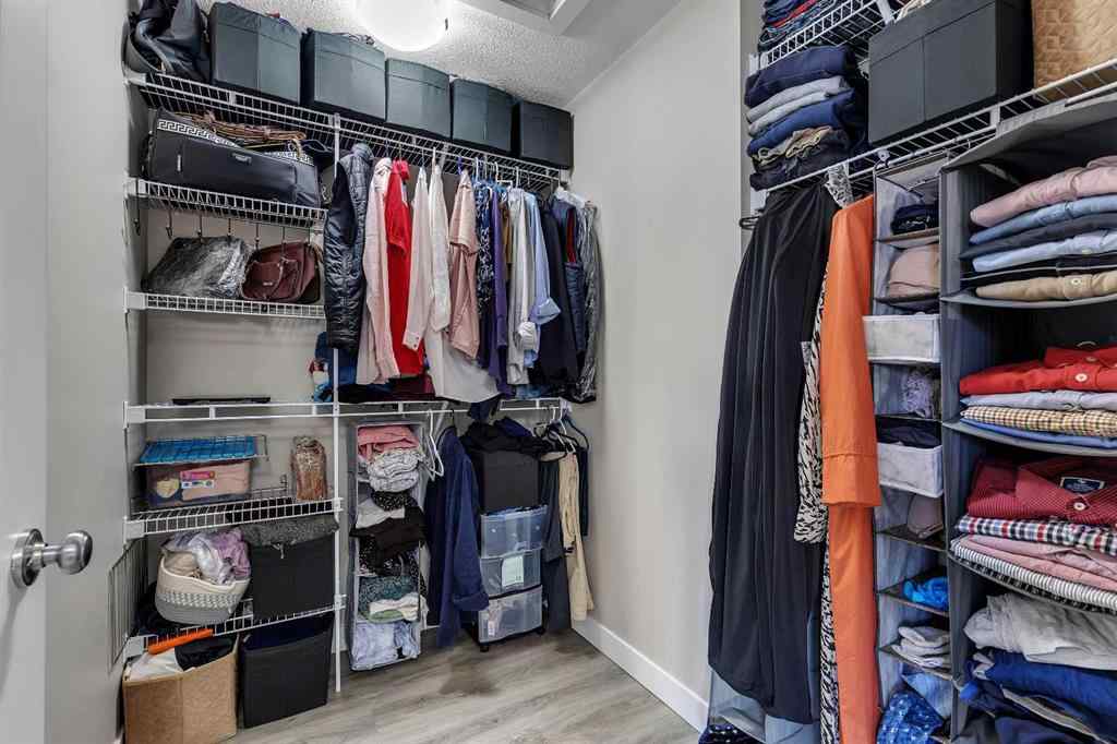 MLS® A2264462 - 7 West Coach Manor SW in West Springs Calgary, Residential