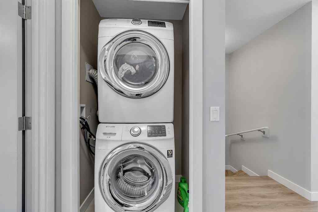 MLS® A2264462 - 7 West Coach Manor SW in West Springs Calgary, Residential