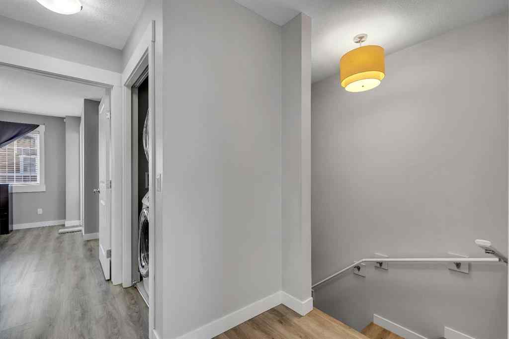 MLS® A2264462 - 7 West Coach Manor SW in West Springs Calgary, Residential