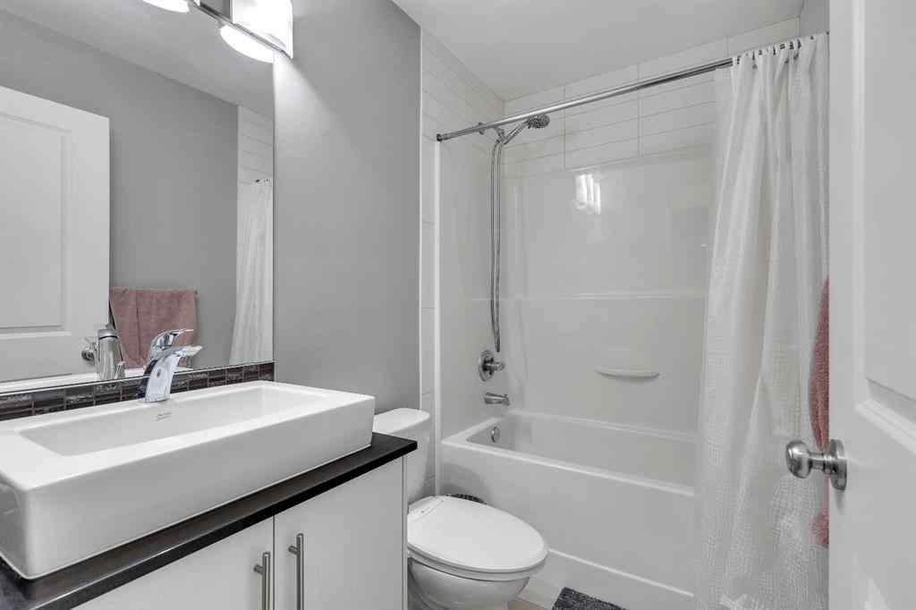 MLS® A2264462 - 7 West Coach Manor SW in West Springs Calgary, Residential