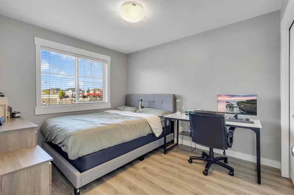 MLS® A2264462 - 7 West Coach Manor SW in West Springs Calgary, Residential