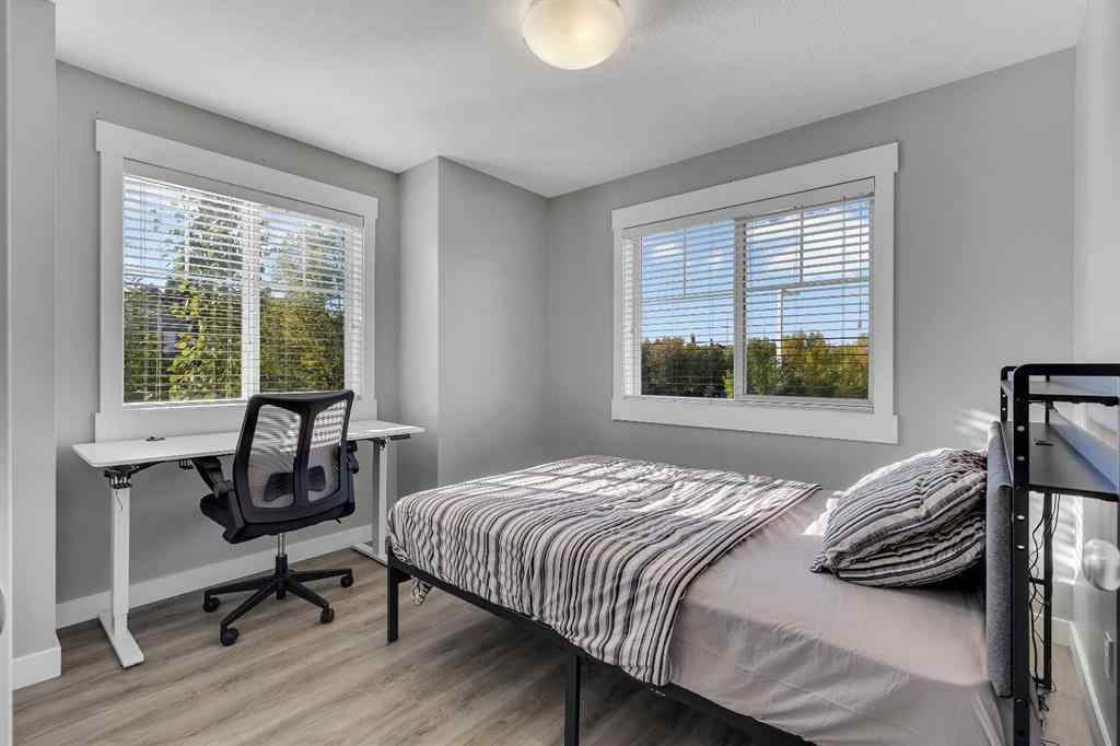 MLS® A2264462 - 7 West Coach Manor SW in West Springs Calgary, Residential