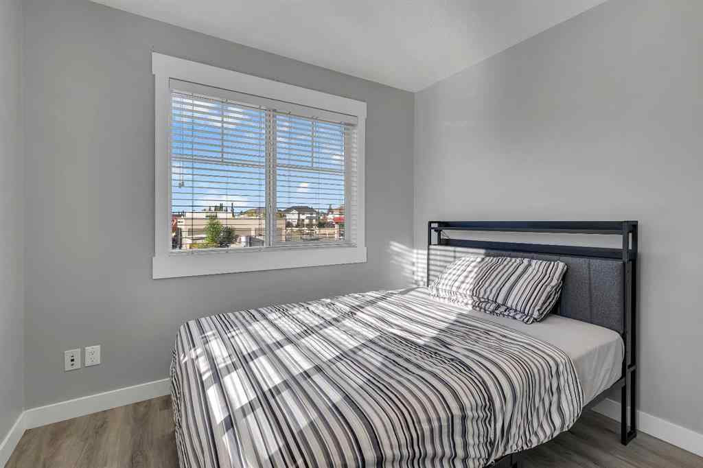 MLS® A2264462 - 7 West Coach Manor SW in West Springs Calgary, Residential
