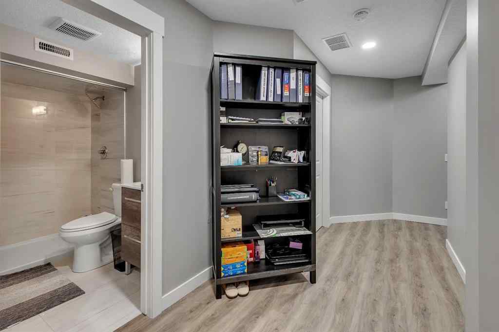 MLS® A2264462 - 7 West Coach Manor SW in West Springs Calgary, Residential