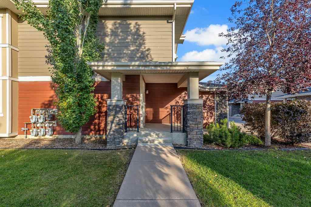 MLS® A2264462 - 7 West Coach Manor SW in West Springs Calgary, Residential