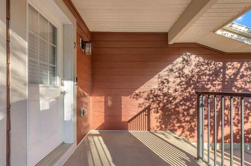 MLS® A2264462 - 7 West Coach Manor SW in West Springs Calgary, Residential