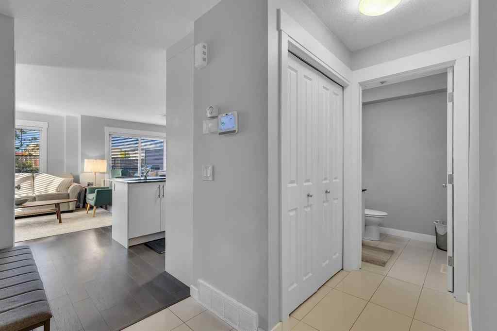 MLS® A2264462 - 7 West Coach Manor SW in West Springs Calgary, Residential