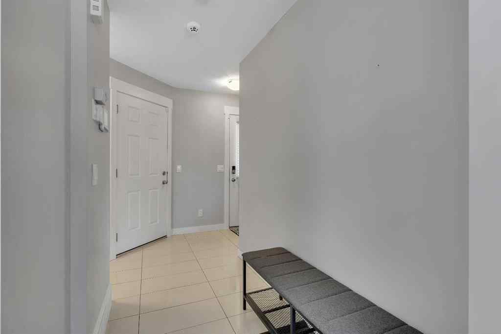 MLS® A2264462 - 7 West Coach Manor SW in West Springs Calgary, Residential