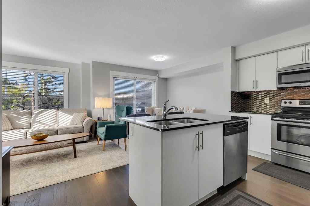 MLS® A2264462 - 7 West Coach Manor SW in West Springs Calgary, Residential
