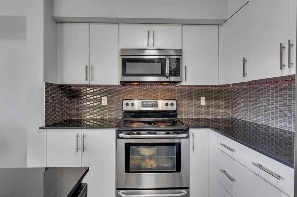 MLS® A2264462 - 7 West Coach Manor SW in West Springs Calgary, Residential