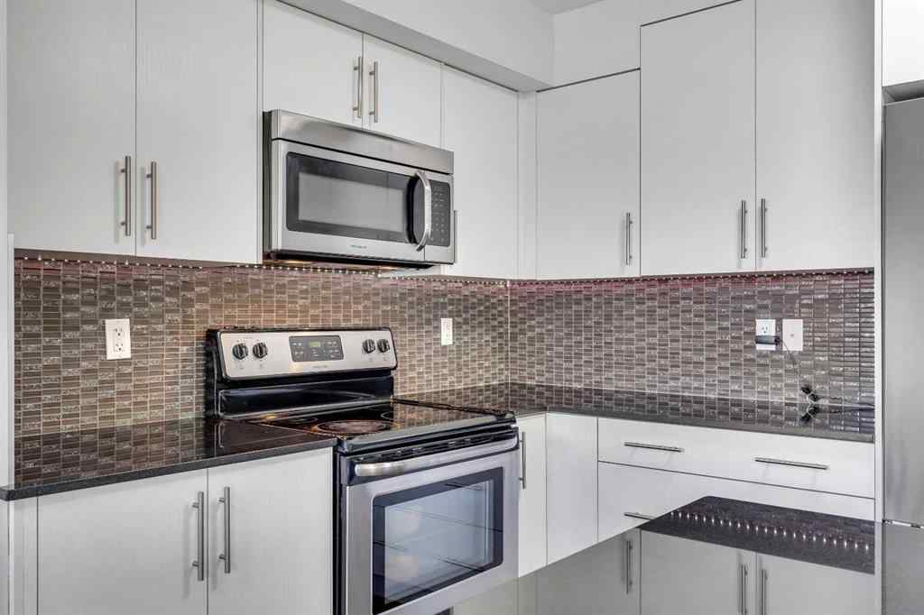 MLS® A2264462 - 7 West Coach Manor SW in West Springs Calgary, Residential