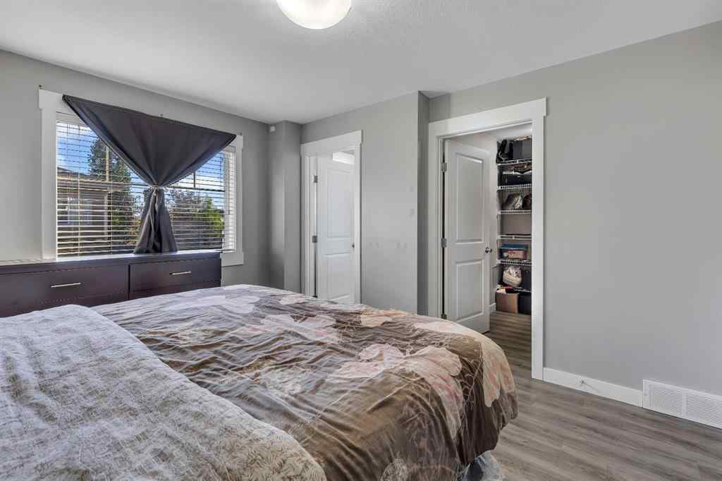 MLS® A2264462 - 7 West Coach Manor SW in West Springs Calgary, Residential