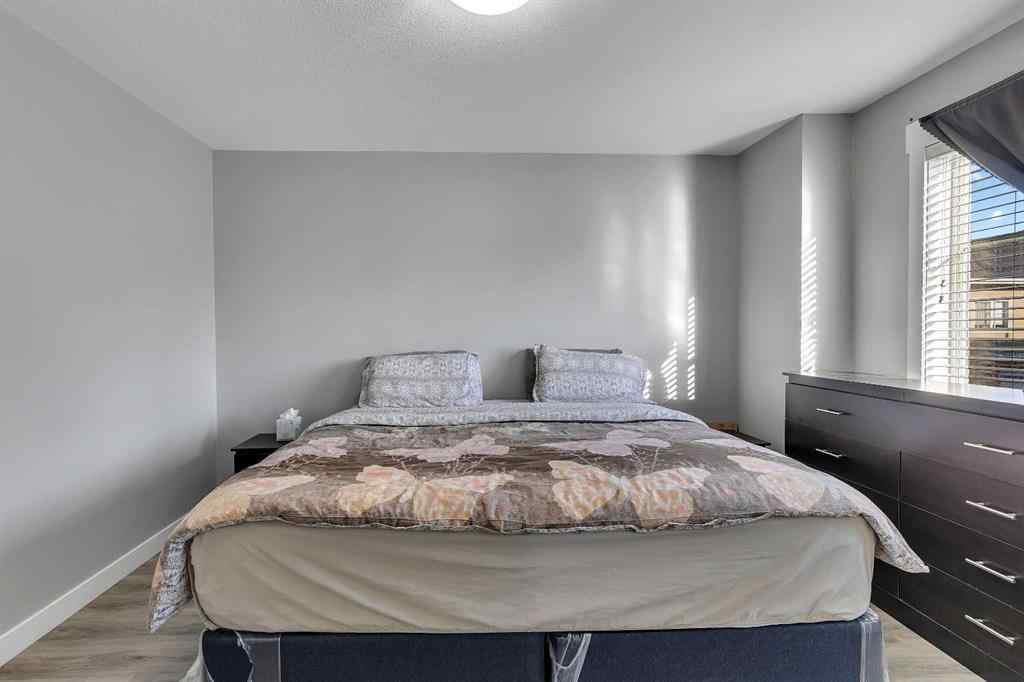 MLS® A2264462 - 7 West Coach Manor SW in West Springs Calgary, Residential