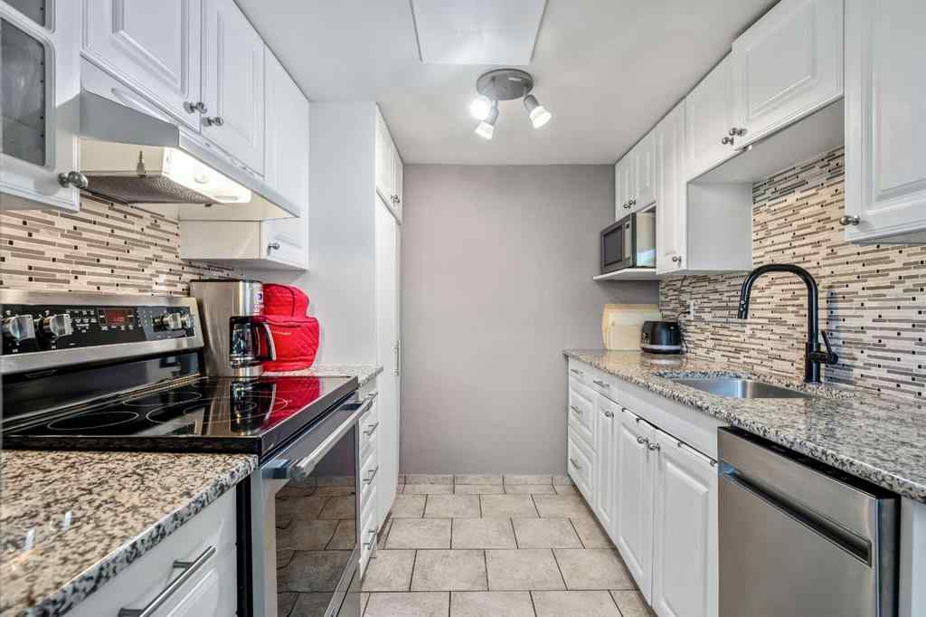 MLS® A2264496 - Unit #2 1055 72 Avenue NW in Huntington Hills Calgary, Residential