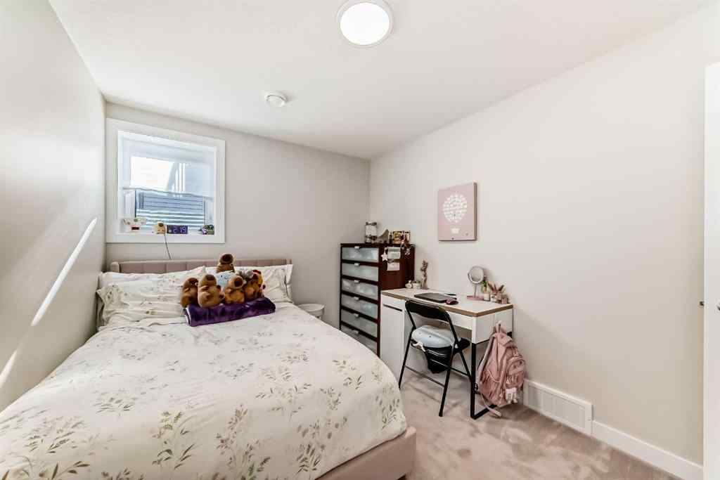 MLS® A2264498 - 86 Wolf Crescent  in Wedderburn Okotoks, Residential