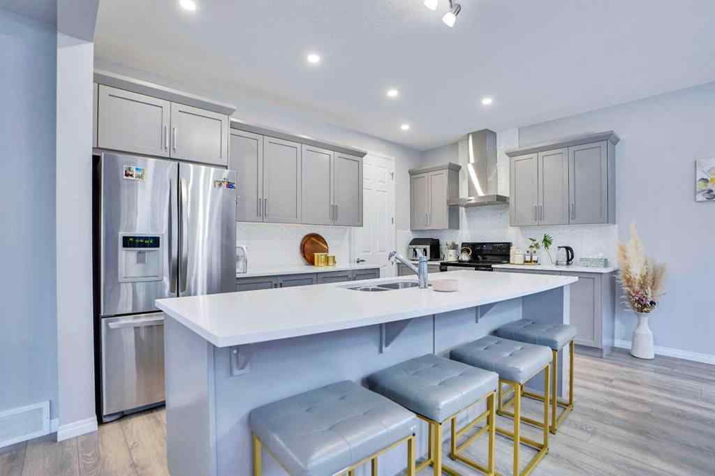 MLS® A2264517 - 59 Osborne Common SW in South Windsong Airdrie, Residential