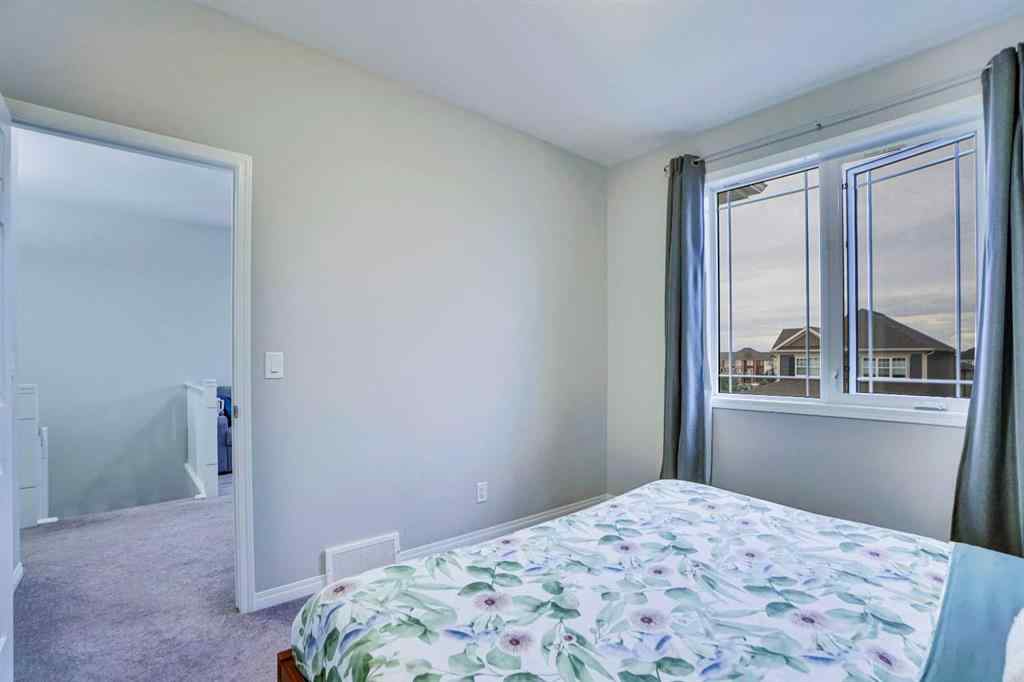 MLS® A2264517 - 59 Osborne Common SW in South Windsong Airdrie, Residential