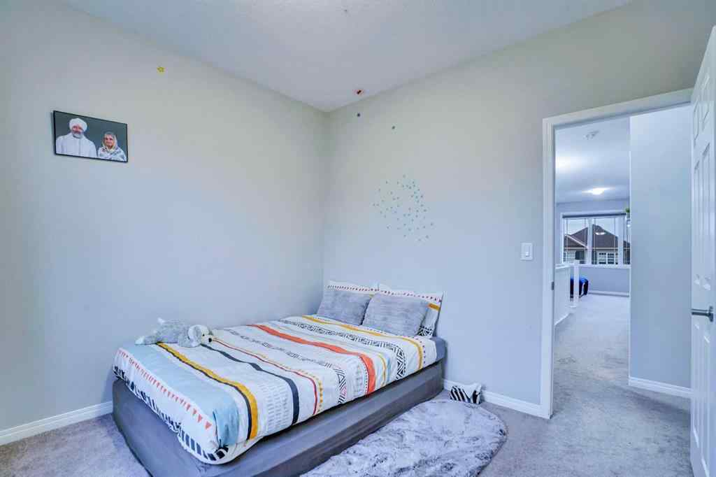 MLS® A2264517 - 59 Osborne Common SW in South Windsong Airdrie, Residential