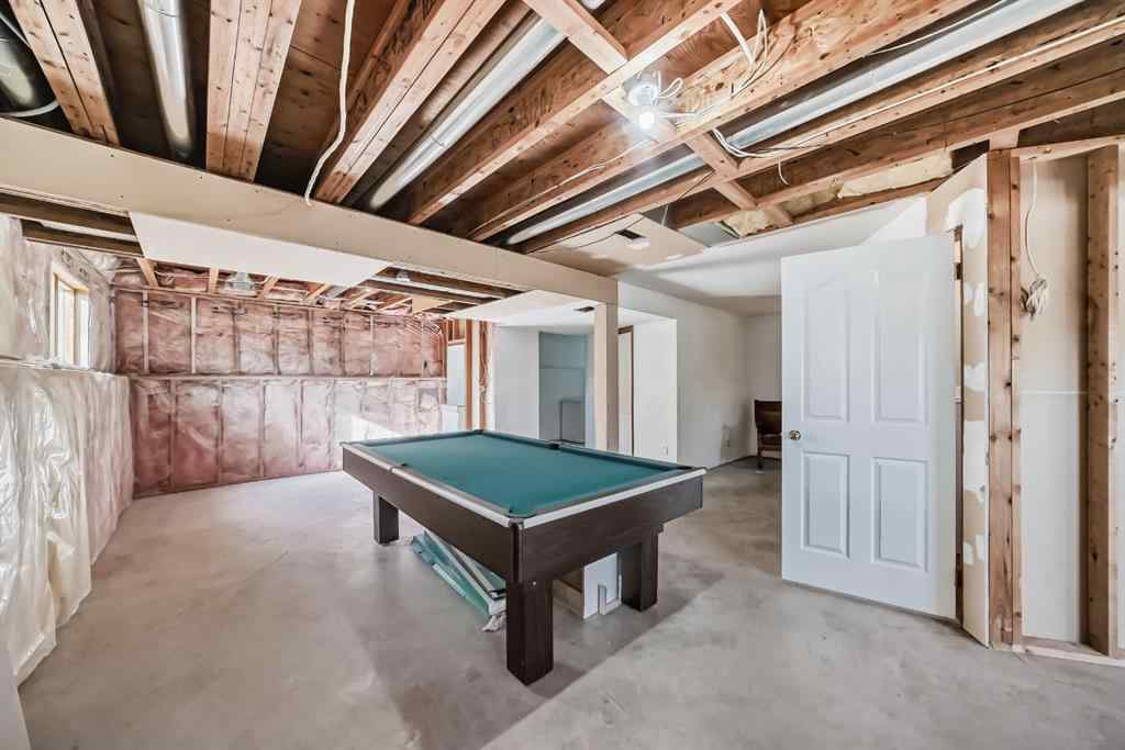 MLS® A2264522 - 152 Quigley Drive  in West Terrace Cochrane, Residential