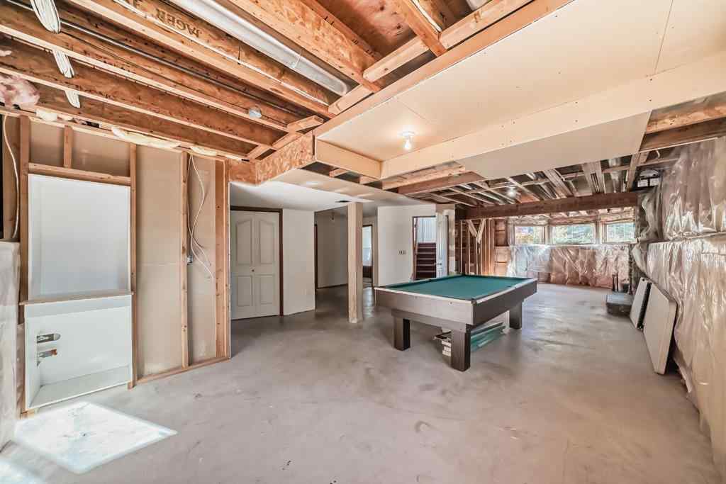 MLS® A2264522 - 152 Quigley Drive  in West Terrace Cochrane, Residential