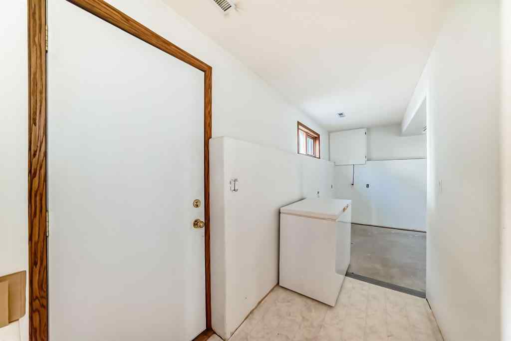 MLS® A2264522 - 152 Quigley Drive  in West Terrace Cochrane, Residential