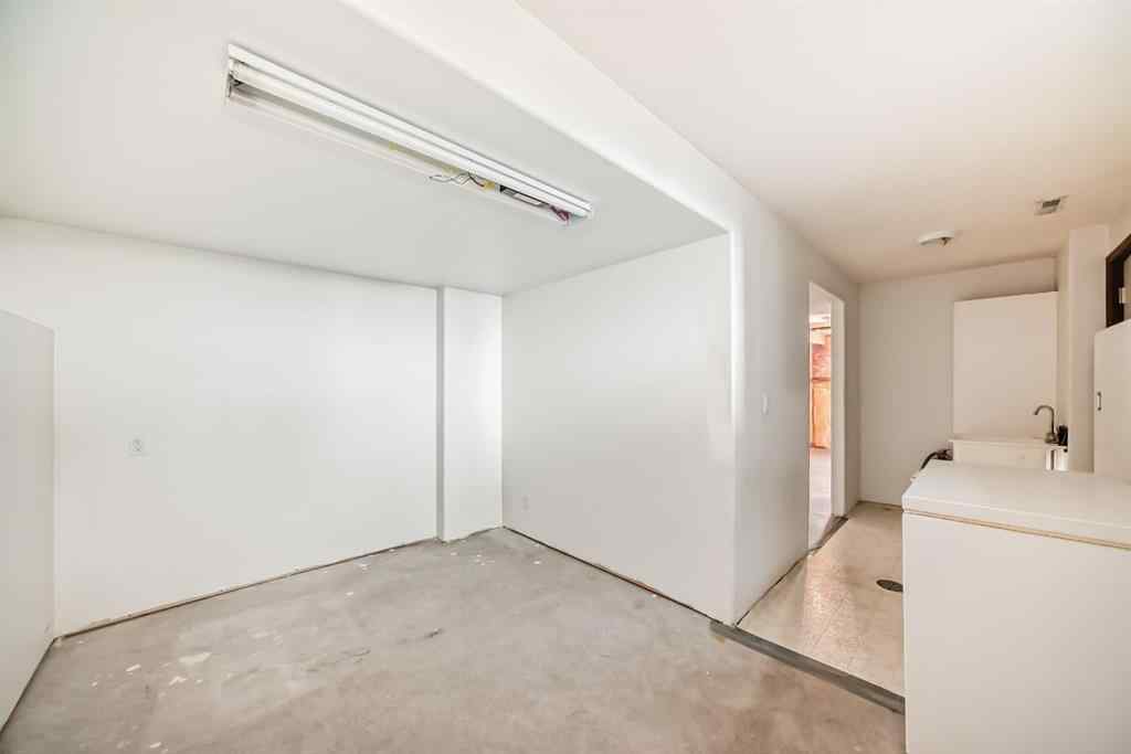 MLS® A2264522 - 152 Quigley Drive  in West Terrace Cochrane, Residential