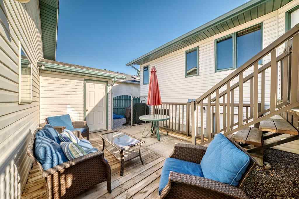 MLS® A2264522 - 152 Quigley Drive  in West Terrace Cochrane, Residential