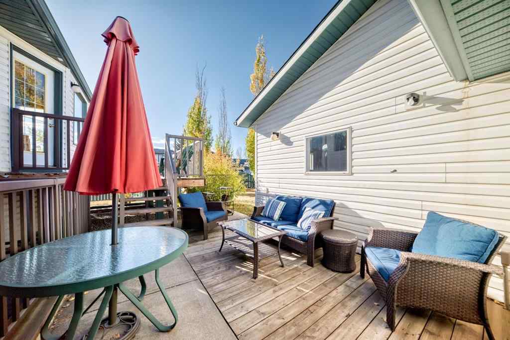 MLS® A2264522 - 152 Quigley Drive  in West Terrace Cochrane, Residential