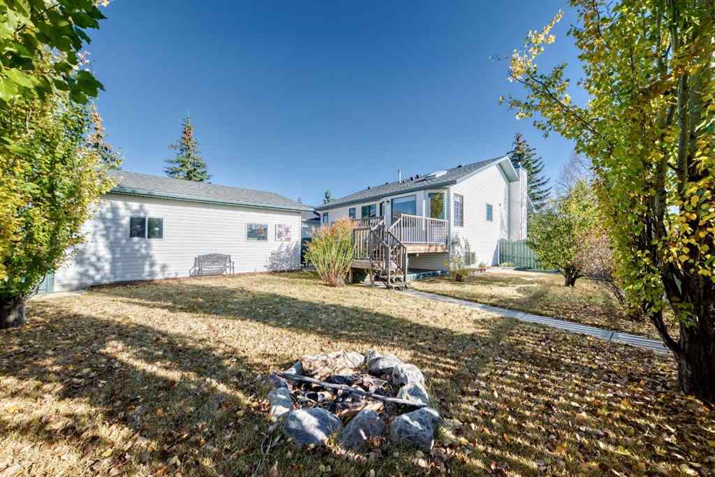 MLS® A2264522 - 152 Quigley Drive  in West Terrace Cochrane, Residential