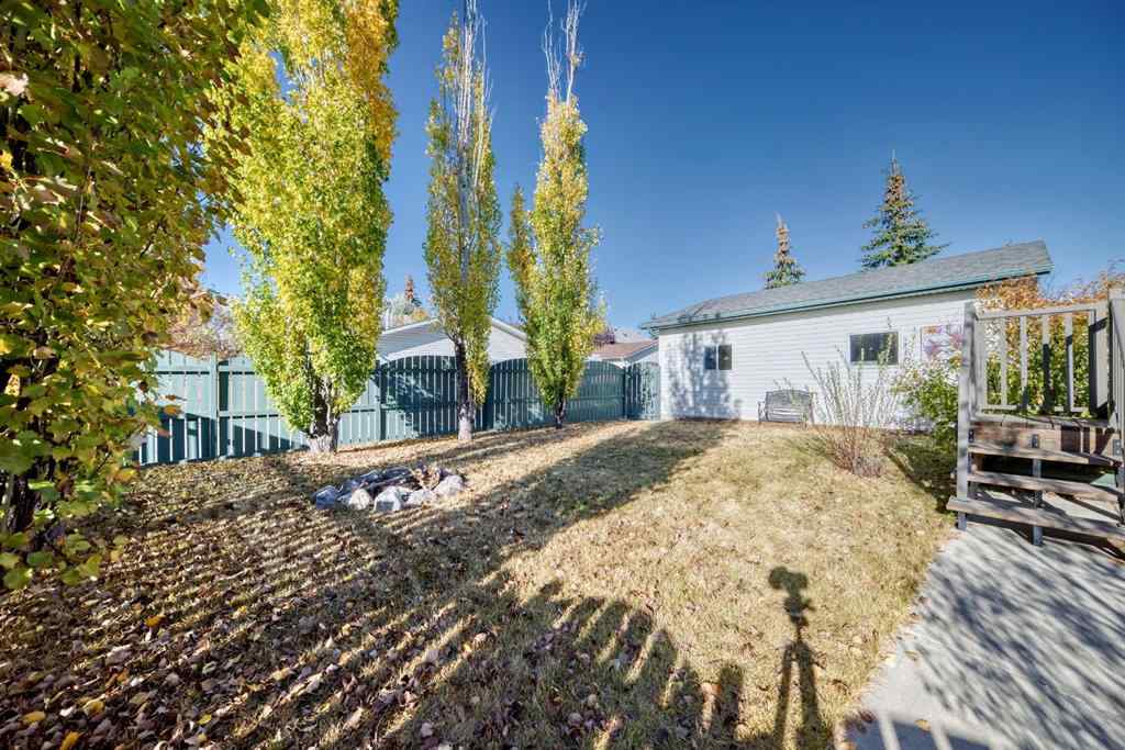 MLS® A2264522 - 152 Quigley Drive  in West Terrace Cochrane, Residential