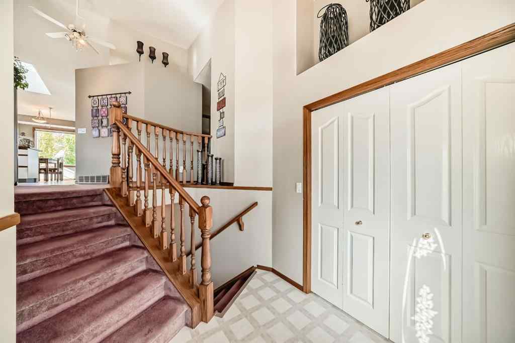 MLS® A2264522 - 152 Quigley Drive  in West Terrace Cochrane, Residential