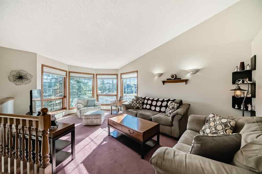 MLS® A2264522 - 152 Quigley Drive  in West Terrace Cochrane, Residential