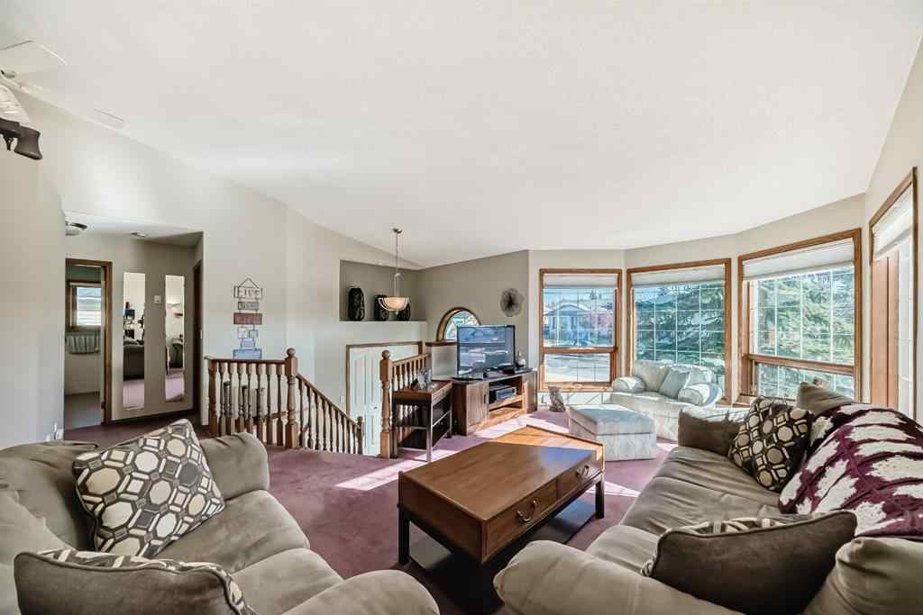 MLS® A2264522 - 152 Quigley Drive  in West Terrace Cochrane, Residential