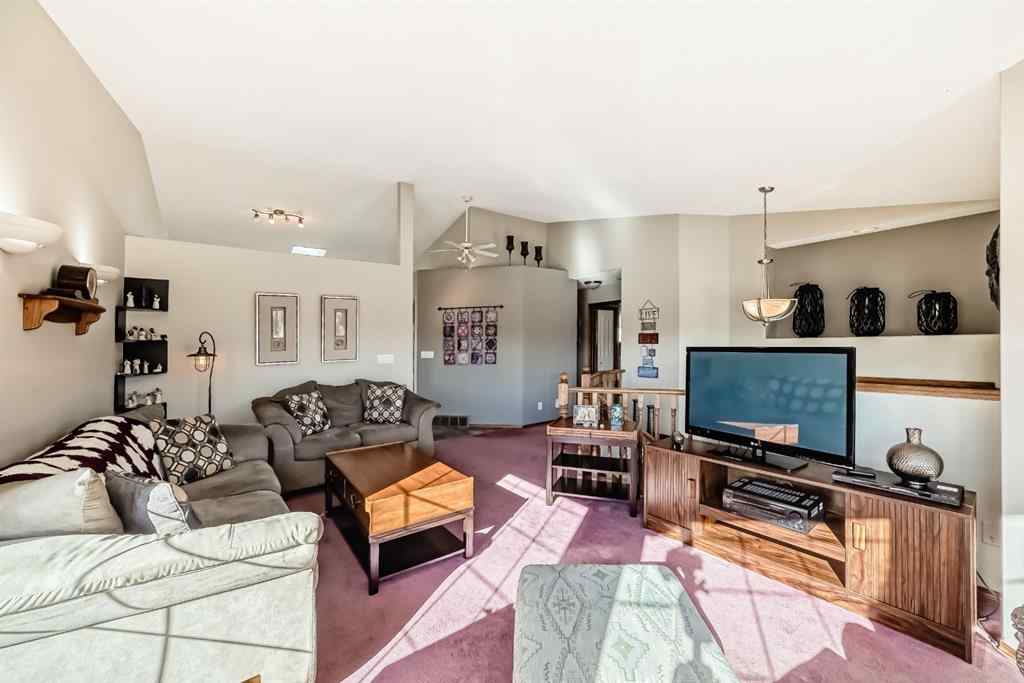 MLS® A2264522 - 152 Quigley Drive  in West Terrace Cochrane, Residential