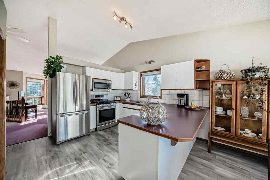 MLS® A2264522 - 152 Quigley Drive  in West Terrace Cochrane, Residential