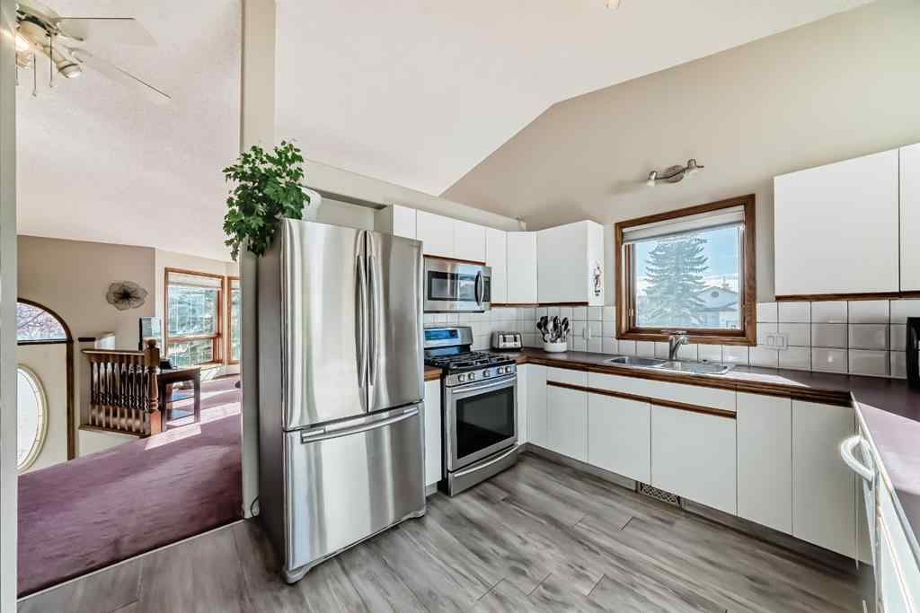 MLS® A2264522 - 152 Quigley Drive  in West Terrace Cochrane, Residential