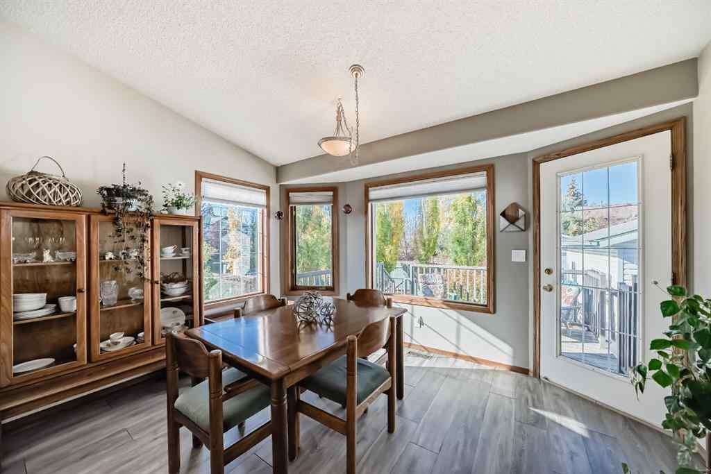 MLS® A2264522 - 152 Quigley Drive  in West Terrace Cochrane, Residential